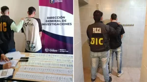 Policías de la Dirección General de Investigaciones trasladan a un hombre durante un procedimiento